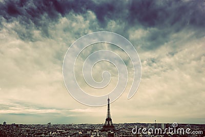 Paris, France skyline with Eiffel Tower. Dark clouds Stock Photo