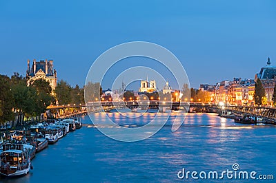 Paris - River Seine at night with Notre-Dame in the background Stock Photo