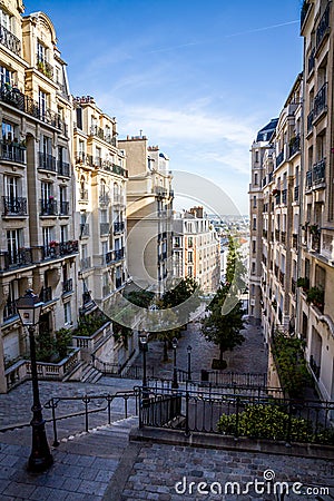 PARIS - September 6, 2019 : Typical Parisian stairway street on Butte Montmartre Editorial Stock Photo
