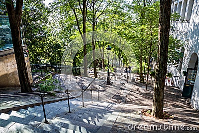 PARIS - September 6, 2019 : Typical Parisian stairway street on Butte Montmartre Editorial Stock Photo