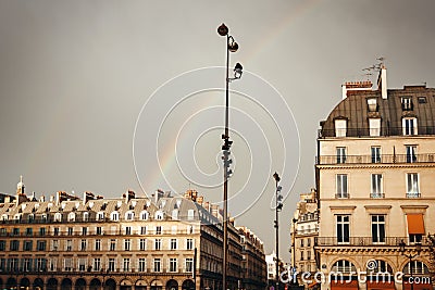 Paris Street View with Rainbow in the Sky After Rain Stock Photo