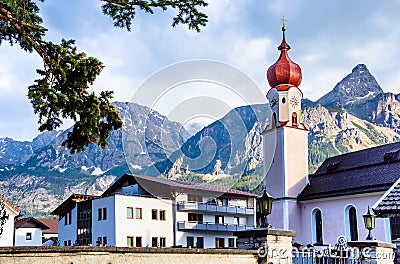 Parish church of Maria Heimsuchung with Sonnenspitze - Ehrwald, Austrian Alps Stock Photo