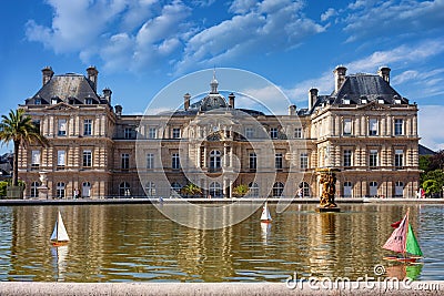 The Parisian citylandscape - view of the Pool with floating toy sailboats in front of the south facade Palais de Luxembourg Editorial Stock Photo