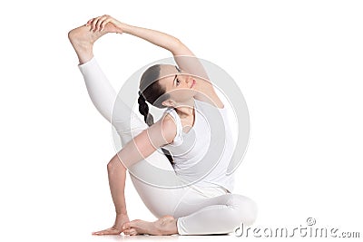 Parivritta Krounchasana yoga Pose Stock Photo