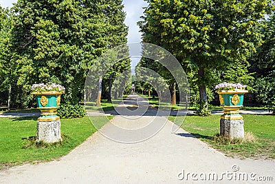Park alley in the Charlottenburg Palace in summer towards the Mausoleum in the castle garden Charlottenburg Stock Photo