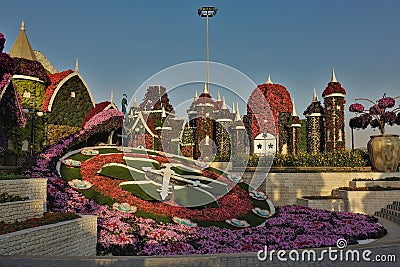 Park design. A flower bed in the shape of a clock Editorial Stock Photo