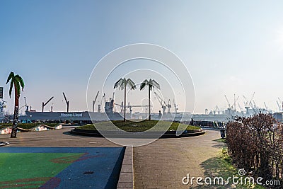 Park Fiction area in Hamburg Sankt Pauli with harbor in background under blue sky Editorial Stock Photo