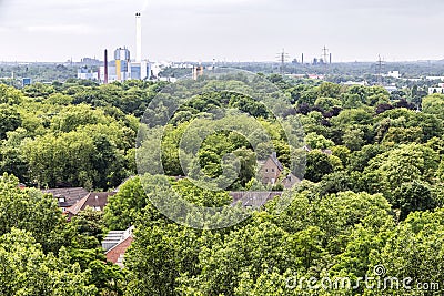 park landscape of the Kaisergarten with view to the industry in Oberhausen, Germany Stock Photo