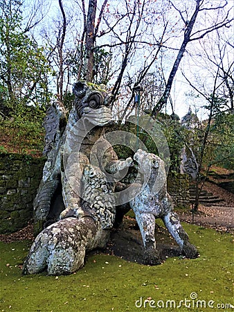 Park of the Monsters, Sacred Grove, Garden of Bomarzo. Dragon with lions, alchemy Stock Photo