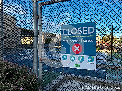 Park playground closed sign due to covid-19 coronavirus Editorial Stock Photo