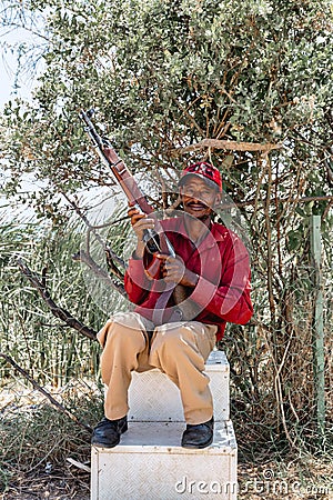 Park scout with rifle in Simien Mountain, Ethiopia Editorial Stock Photo