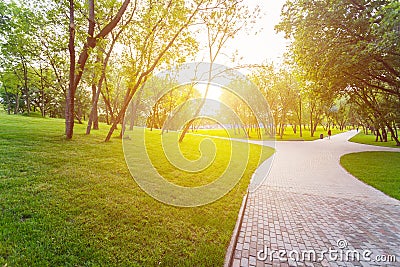 Park with trees and lawn near the entertainment center Island of dreams Stock Photo