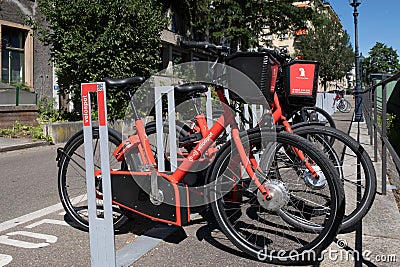 Parked bicycles from Velospot in Basel, Switzerland Editorial Stock Photo