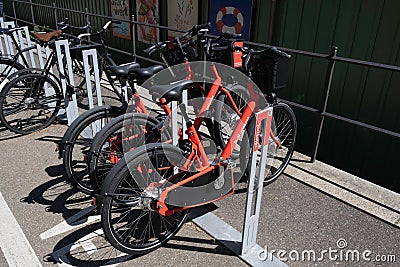 Parked rental bicycles from Velospot in Basel, Switzerland Stock Photo