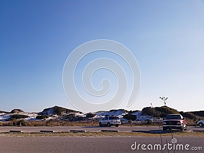 Parking lot at Beautiful Grayton beach in Florida panhandle during early spring Editorial Stock Photo
