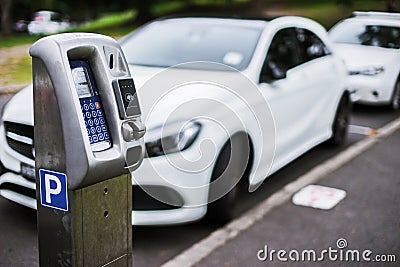 Parking machine or Parking meters with electronic payment in the city streets Stock Photo