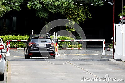 Parking place of the building, with automatic barrier system Stock Photo