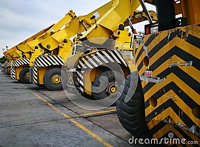 Parking Space Area With Yellow Strip Line For Heavy Transportation Equipment Container Handlers Stock Photo