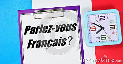 Parlez - vous franÃ§ais ? The inscription on the notebook is in French. Stock Photo