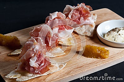 Parma ham on flatbread Stock Photo