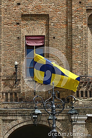 Parma, view of the palace of municipality with flag of the city Stock Photo