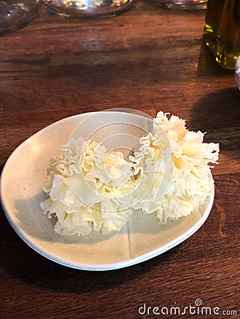 Parmesan served in rosettes Stock Photo