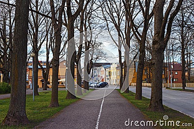 PARNU, ESTONIA - MAY 02, 2015: Walking alley along the side of the road in the city of Parnu Editorial Stock Photo