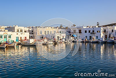 Naoussa harbor with traditional Greek houses in the Cycladic style, Paros island, Greece. Editorial Stock Photo