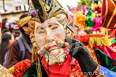 Traditional folk dancer in Spanish conqueror mask & costume, Guatemala Editorial Stock Photo