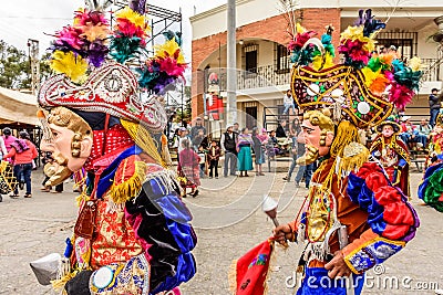 Traditional folk dancers in street, Guatemala Editorial Stock Photo