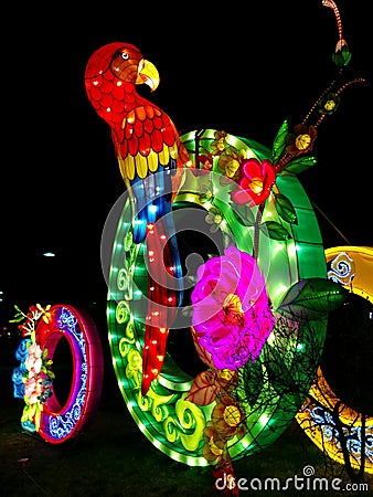 Parrot on jade ring at Chinese lantern festival Editorial Stock Photo