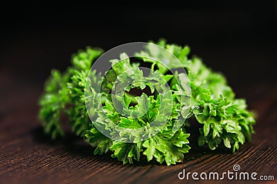 Parsley on a wooden board Stock Photo