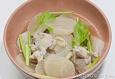 Parsnip soup with pork bone. Stock Photo