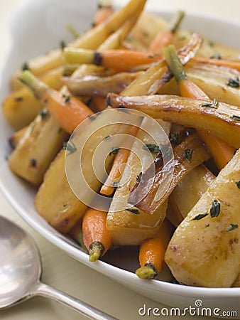 Parsnips and Baby Carrots Roasted in Thyme Stock Photo