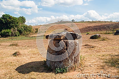 Part of archaeological site which was destroyed from exploded cluster bombs - Plain of Jars. Stock Photo