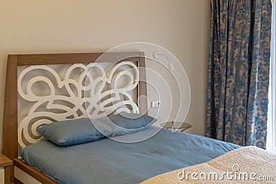 The interior in blue-beige of the bedroom Stock Photo