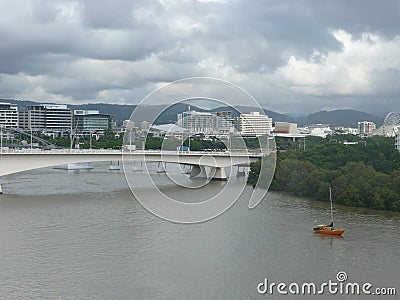 Part from a bridge before shore with residential houses Stock Photo