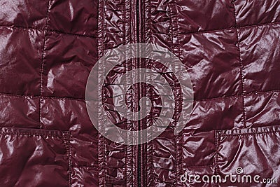 Part of burgundy women`s leather jacket with zipper in middle. Top view. Close-up Stock Photo