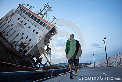 Part of a cargo shipwreck exterior in port. Stock Photo