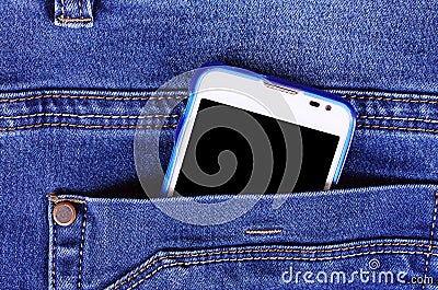 Part of cellphone in blue jeans pocket Stock Photo