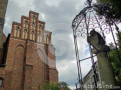 Church of St. Nicola with the statue of a bear to Berlin in Germany. Editorial Stock Photo