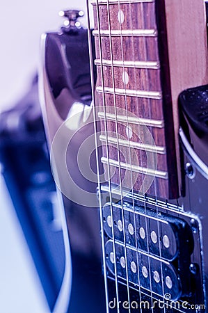 Part electric guitar and classic amplifier on a dark background Stock Photo