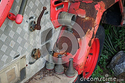 An Old part fire truck a Vintage, Rusting Fire Truck . Stock Photo