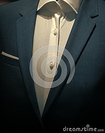 Part of formal male garment, close up. Classic jacket with white shirt made out of high quality textile, luxury clothes Stock Photo