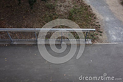 Part of a galvanized steel handrail. Stock Photo