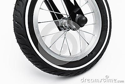 Part of kids bicycle wheel with spokes, white background Stock Photo