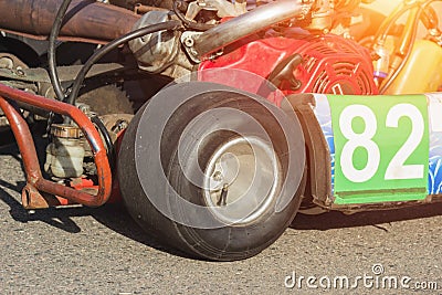 Part of the racing kart close-up, wheel map and motor, motor sports, karting competitions, extreme Stock Photo