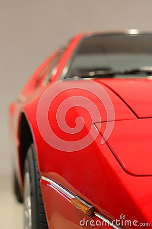 Part of red old sports car with front light Editorial Stock Photo