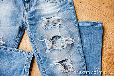 Part of ripped jeans Stock Photo