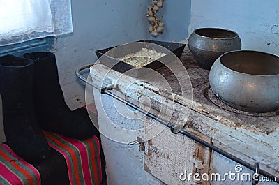 Part of the room with a stove near the window Stock Photo